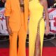 Here they come: Amanda Holden and Alesha Dixon rewarded onlookers with a touch of glamour on Tuesday after dozens of patient fans dismissed the cold in the hope of catching sight of this year