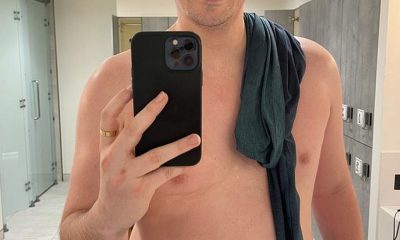 Dr. Alex George defies 'fat shamers' with a celebratory shirtless snap 
