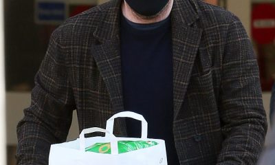 Emerging: Danny Dyer looked less than impressed after being forced to wait around in an Essex car park on Sunday morning when a fellow shopper parked too close to his Bentley
