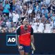 Nick Kyrgios and Thanasi Kokkinakis are in to the Australian Open doubles semi-finals after winning a drama-packed and controversial match in front of their raucous home crowd