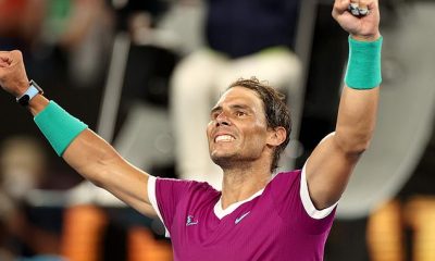 Rafael Nadal celebrates winning match point as he progressed into the Australian Open final