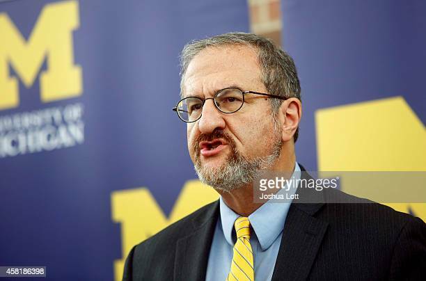 Who is Mark Schlissel, the former president of the University of Michigan?