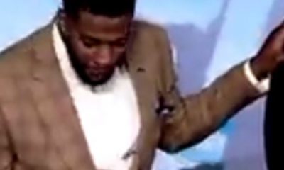 Pastor coughs and rubs spit on churchgoer's face to 'prove a point' (video)
