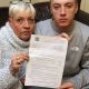 Amanda Martindale of Stanley, County Durham, with her son Alex, 23, and the £1,600 penalty notice imposed by bailiffs after he attended a party during lockdown last March