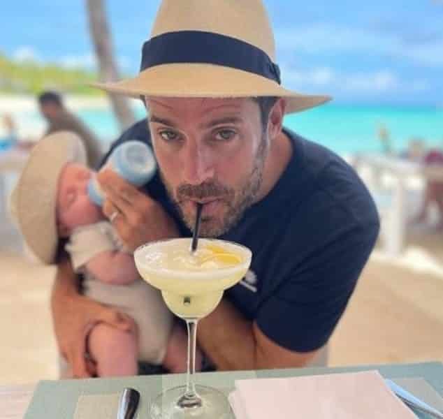 Jamie Redknapp bottle feeds baby Raphael on first holiday to Maldives while sipping on a cocktail