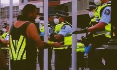 Kiwi police have been spotted joining a game of rock paper scissors with a demonstrator on the frontline of New Zealand