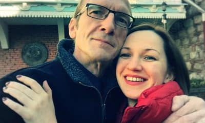 Ken Stewart, 54, and his wife Tania, 36, (pictured together) are stranded as their baby Douglas does not yet have a passport, according to The Mirror