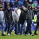 Reading supporters storm the pitch after suffering a seventh consecutive league defeat
