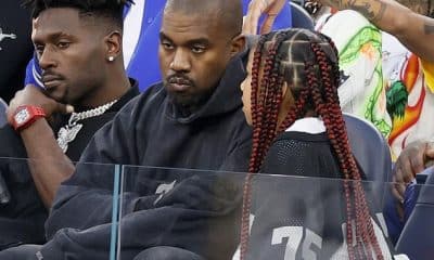 Family first: Kanye West was joined by daughter North West, eight, at the Super Bowl taking place at SoFi Stadium to watch the LA Rams take one the Cincinnati Bengals