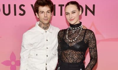Jesse Rutherford and Devon Lee Carlson posing for a picture.