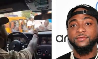 Davido protests as excited fans nearly damage his Rolls Royce in Lagos