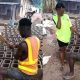 Mixed reactions as Bricklayer proposes to his babe at construction site